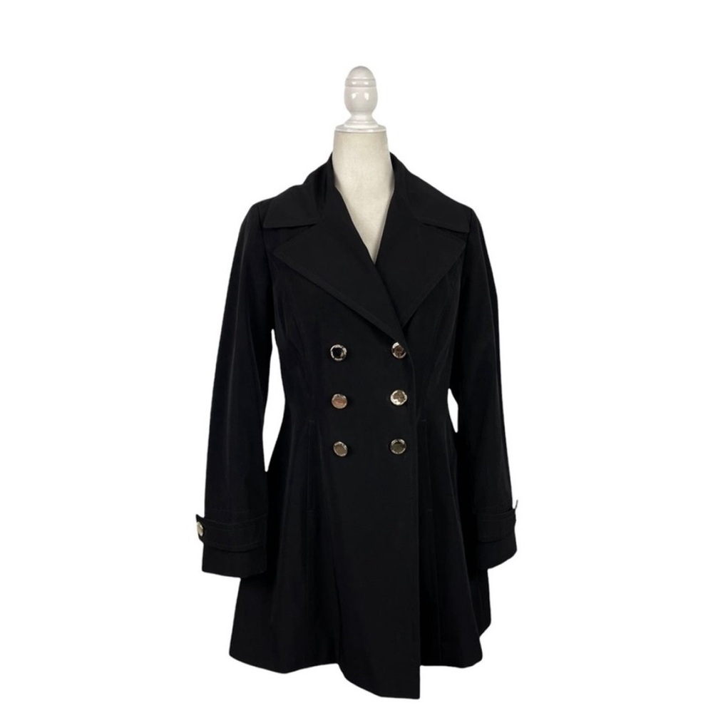 Ivanka Trump, double-breasted trench coat with beautiful floral lining.